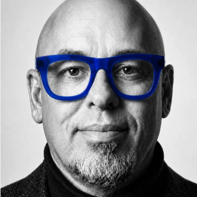 Morgan Sage Norman wearing blue glasses