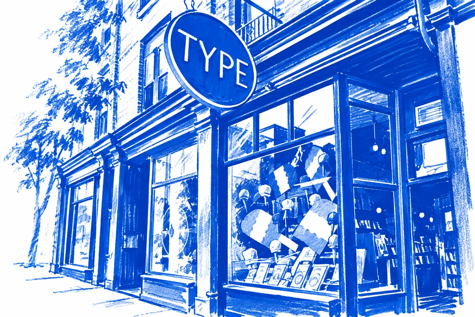 Detail of the TYPE Books sign and window in Toronto, drawn in Klein blue